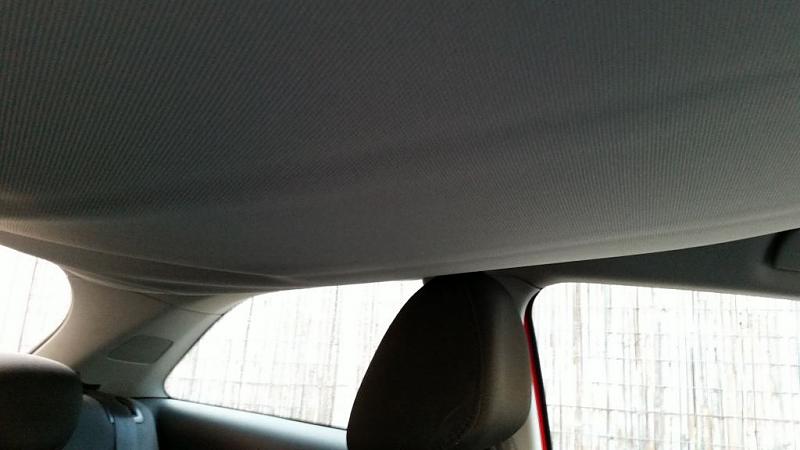 Roof lining fabric completely stratified and fell down at Luxury car Audi after 4 yea-20160731_1904250003.jpg