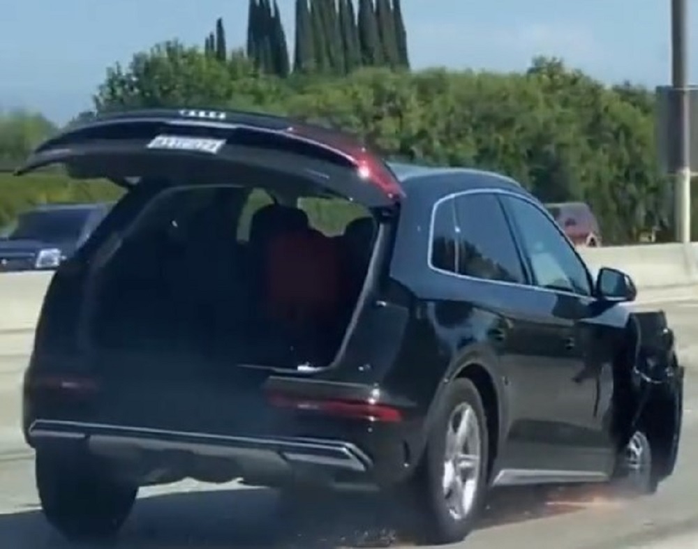 Woman Drives 80mph on the Freeway in an Audi SUV with Only 3 Wheels (Sparks Flying!)